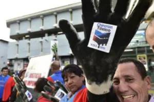 Activists protest against US multinational energy corporation Chevron at a square in Quito RODRIGO BUENDIA/Getty Images